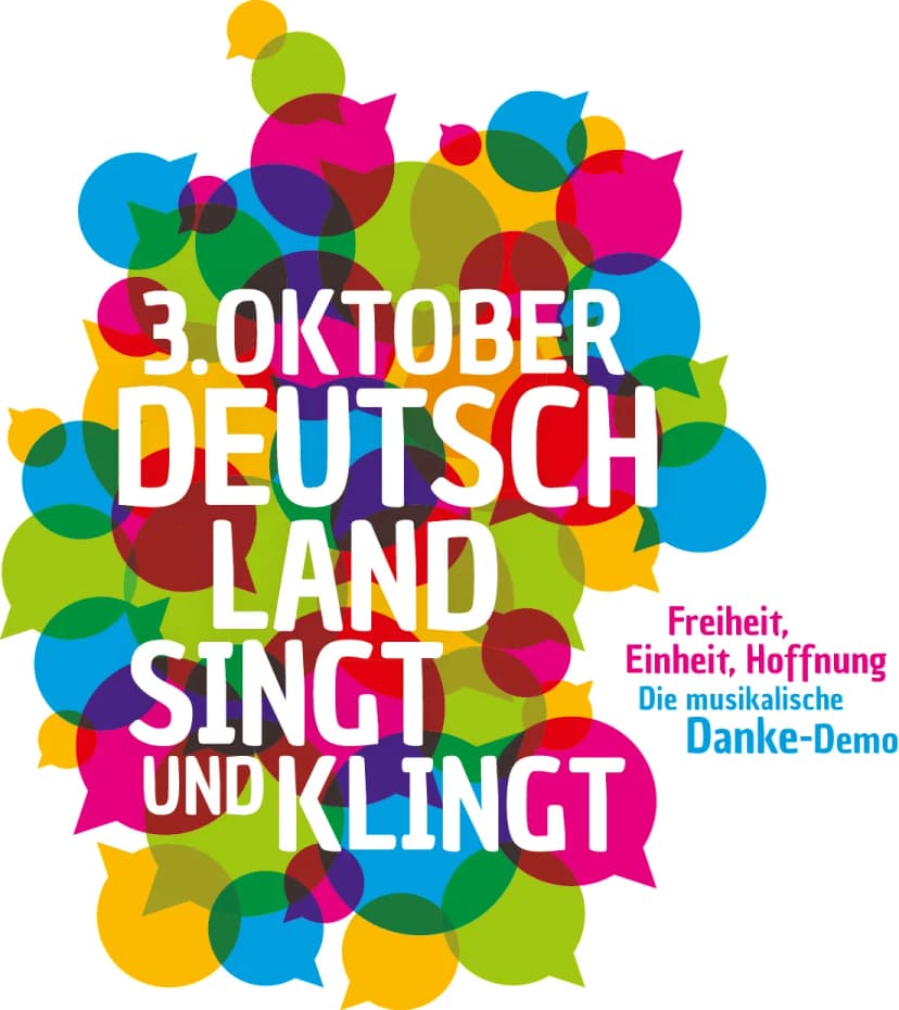 Plakat mit bunten Sprechblasen in Pink, Blau, Grün, Gelb und Rot, darauf der Text: 3. Oktober – Deutschland singt und klingt – Freiheit, Einheit, Hoffnung – Die musikalische Danke-Demo.
