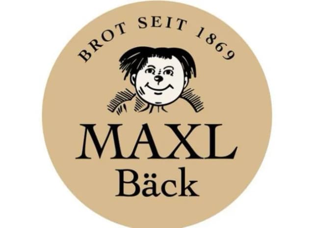 Logo der Bäckerei Maxl Bäck mit Schriftzug „Brot seit 1869“