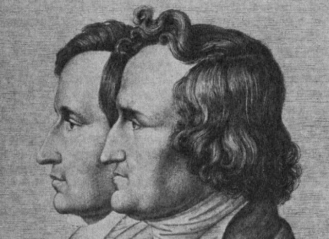 Historische Zeichnung im Profil zweier Männer mit lockigem Haar, im Stil eines Doppelporträts der Brüder Grimm