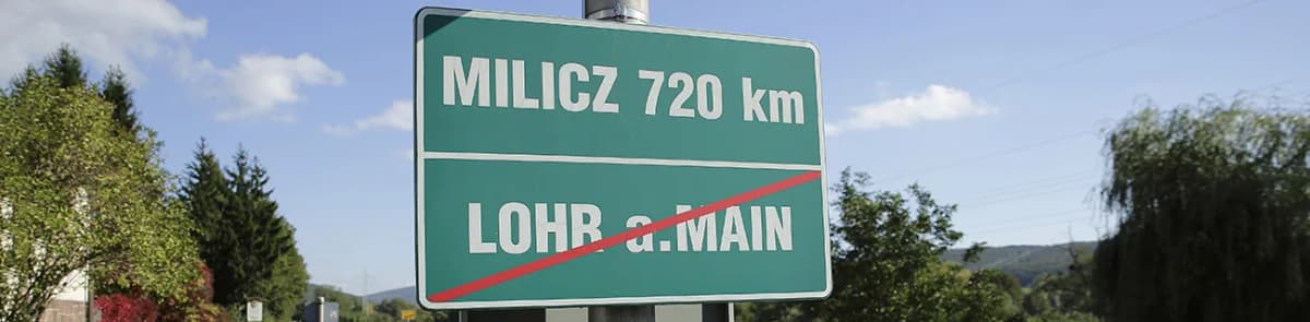 Ortsausgangsschild Lohr a.Main mit Zusatzschild zur Partnerstadt Milicz, Entfernung 720 km